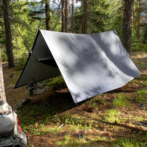 Trek Light Bug & Rain Hammock Accessory Kit set up in a forest, providing shelter and comfort for hammock campers.