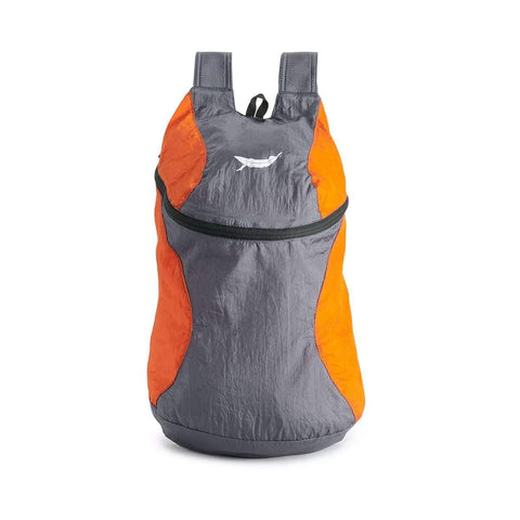 Orange and gray Bindle Daypack by Trek Light, ultralight and strong, ideal for any adventure.