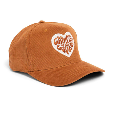 Brown snapback hat with 'Camping Is For Lovers' embroidery on a heart patch, perfect for outdoor adventures. Trek Light.