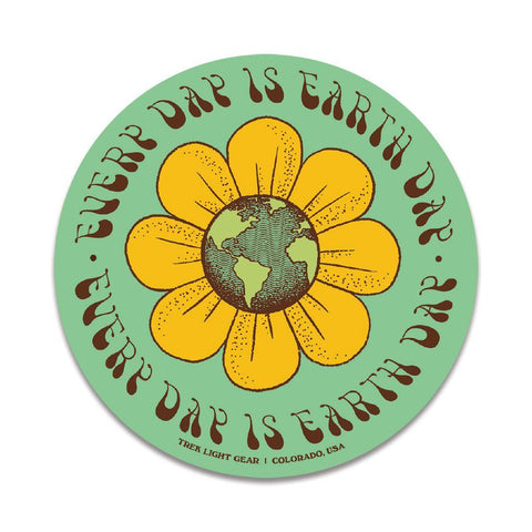 Trek Light Earth Day sticker featuring a vibrant flower and globe design, celebrating environmental awareness daily.