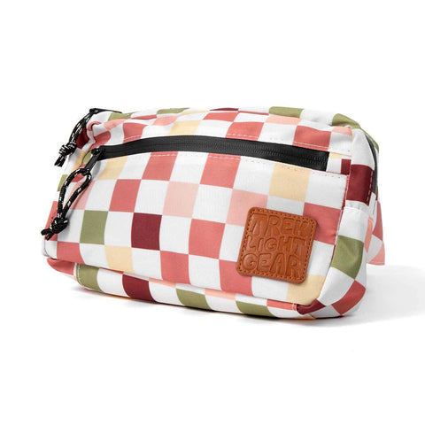 Checkered Everyday Fanny Pack by Trek Light, versatile hip and sling bag with pockets, featuring stylish design and convenience.