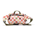 Colorful checkered Trek Light Everyday Fanny Pack, versatile as a hip pack or shoulder sling with ample pockets. Adventure vibes!