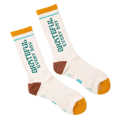 Trek Light Grateful Every Day Socks with yellow, brown accents; comfy, breathable crew socks perfect for daily wear.