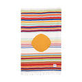 Trek Light Halley's Comet Blanket with colorful stripes and orange circle, handmade from recycled materials. Eco-friendly and unique design.