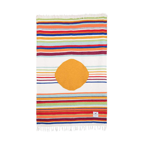 Trek Light Halley's Comet Blanket with colorful stripes and orange circle, handmade from recycled materials. Eco-friendly and unique design.