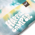 Close-up of Happiest Camper tie dye beanie by Trek Light, featuring vibrant colors and embroidered text. Perfect for a cozy, stylish look.