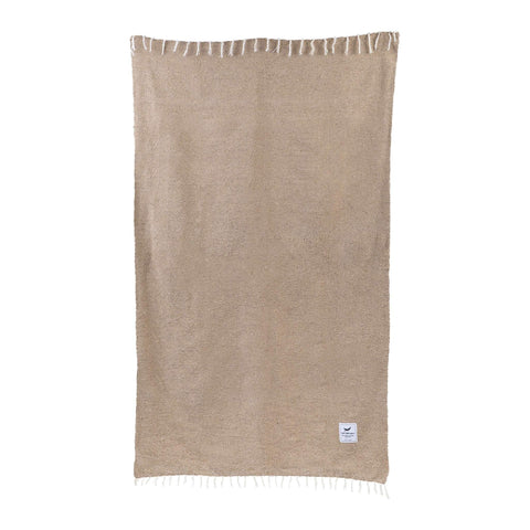 Trek Light Huntington Blanket in sand color, perfect for beach, desert, or home comfort, inspired by Surf City culture.