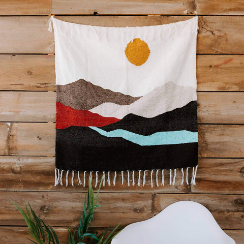 Handwoven Mountains Blankestry with colorful landscape design, perfect for home or travel decor by Trek Light, eco-friendly material.