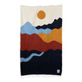 Handwoven Trek Light Mountains Blanket with colorful mountain design, crafted from recycled materials for cozy adventures.