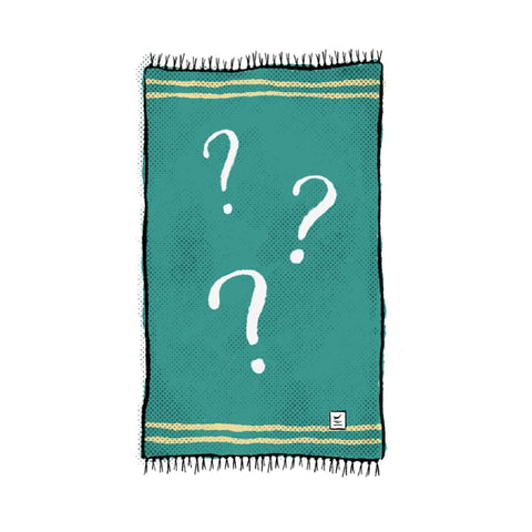 Illustration of a mystery blanket, featuring question marks, symbolizing a surprise handwoven, beautiful, cozy, versatile blanket from Trek Light.