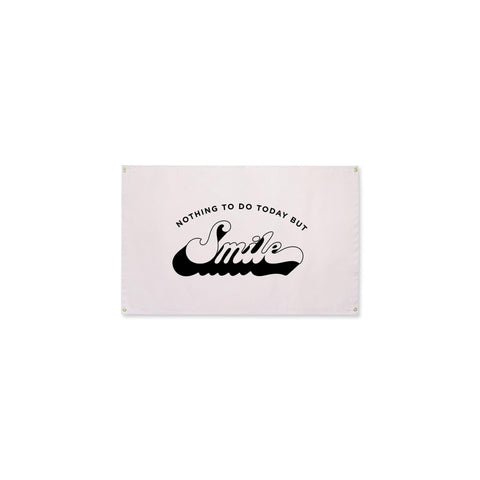 Nothing To Do Today But Smile canvas flag by Trek Light, featuring a whimsical hand-screened print on natural cotton with brass grommets.