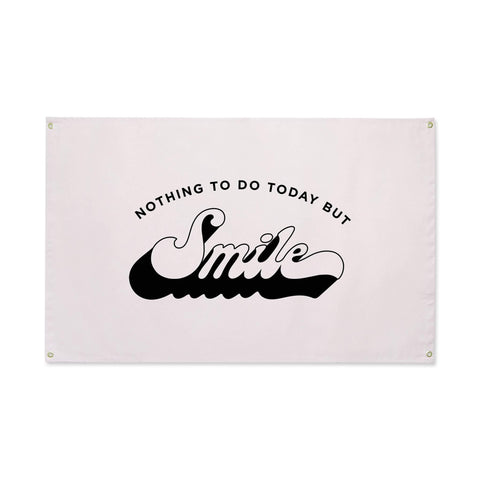 Trek Light 'Nothing To Do Today But Smile' Canvas Flag with handcrafted design and brass grommets for hanging.