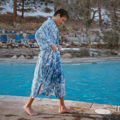 Unisex Sky Dye Robe by Trek Light, showcasing cozy fit and eco-friendly style near a swimming pool, perfect for shared wardrobes.