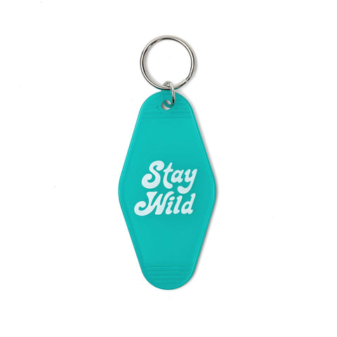 Stay Wild Key Tag by Trek Light: Retro vintage-style keychain in teal with bold white lettering. Perfect for your adventurous lifestyle.