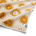 Trek Light Sunny Bath Towel with sun pattern, 100% sustainable cotton, soft and absorbent 550 GSM, eco-friendly luxury.