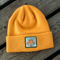 Trek Light Wild & Free Kids Beanie in mustard color, perfect for the adventurous spirit, embracing the best way to be outdoors.